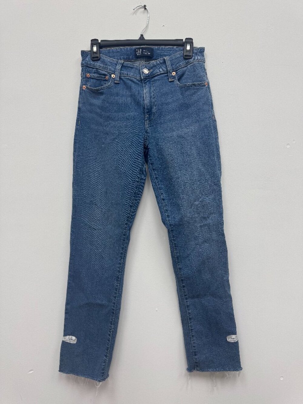 GAP denim with raw edge hem and satin bow detail